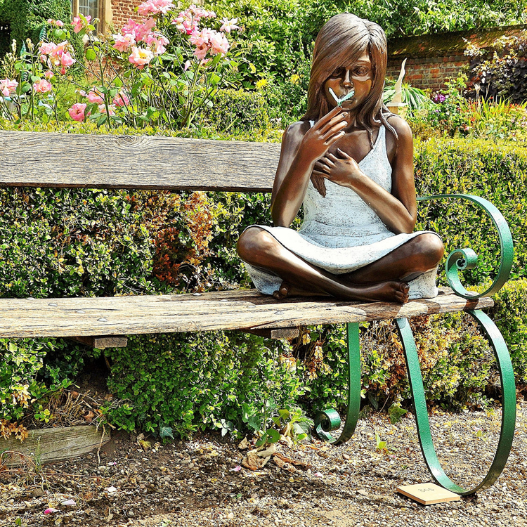 bronze life size sitting girl sculpture