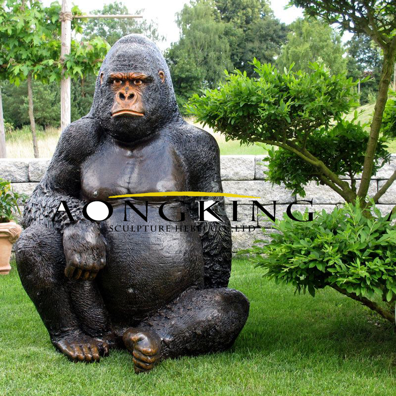 yard sculpture of life-size bronze gorilla statue