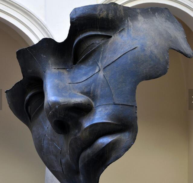 bronze abstract face sculpture