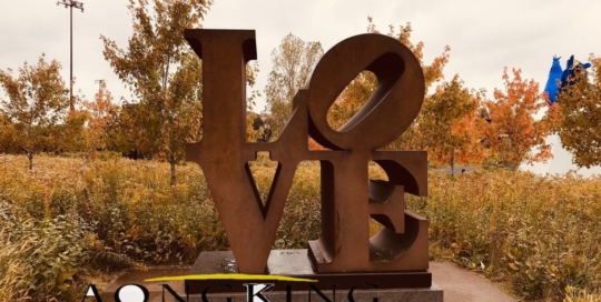 Corten steel sculpture of love alphabet