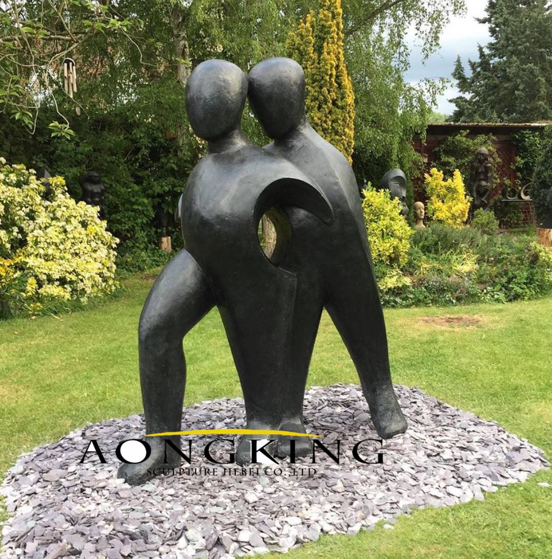 Abstract bronze sculpture of husband and wife