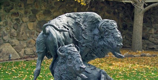 Bison sculpture statue of change of seasons