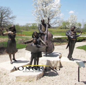 Bronze garden sculpture of music figures