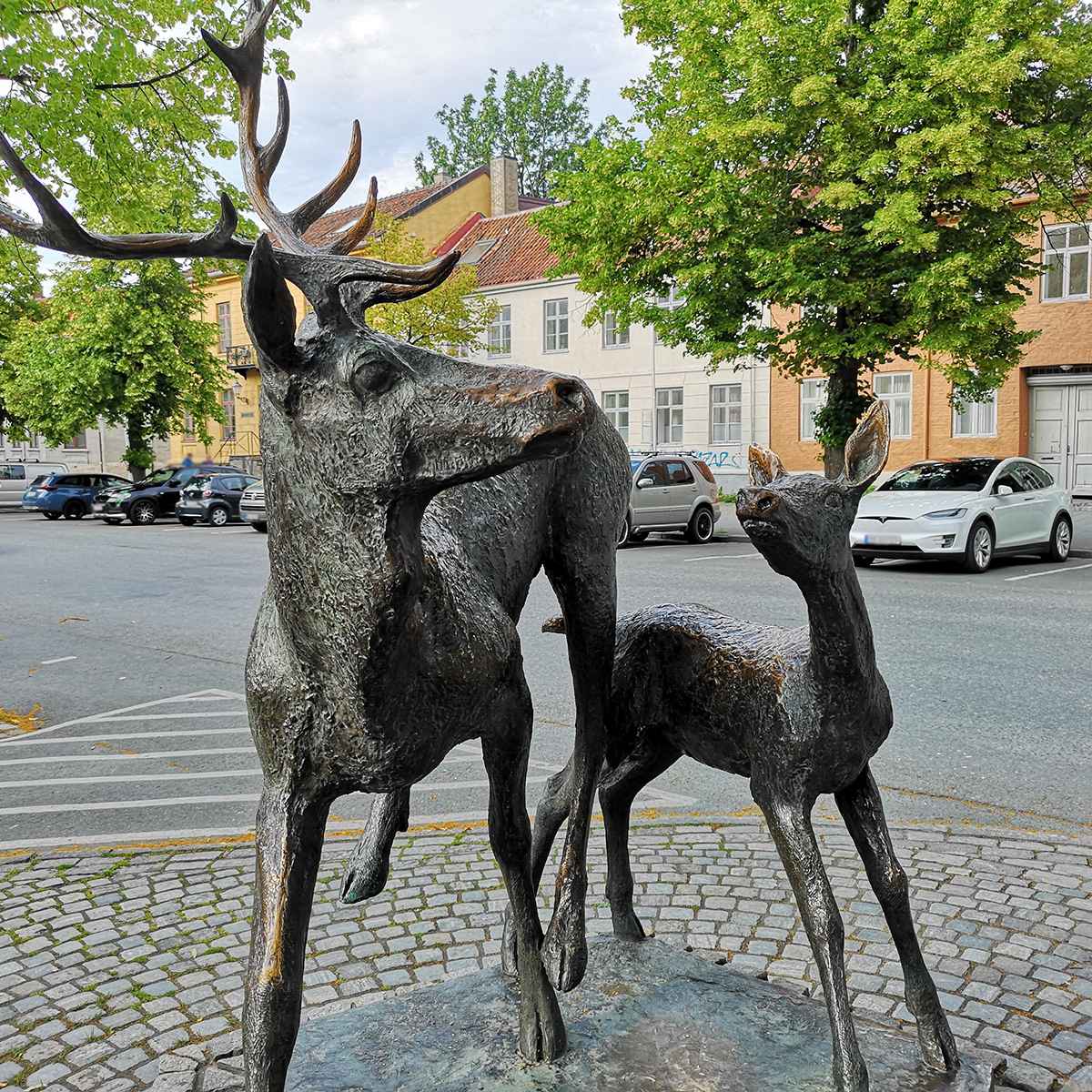 Buck statue with baby