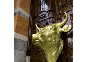 Golden bull head statue hanging on the door