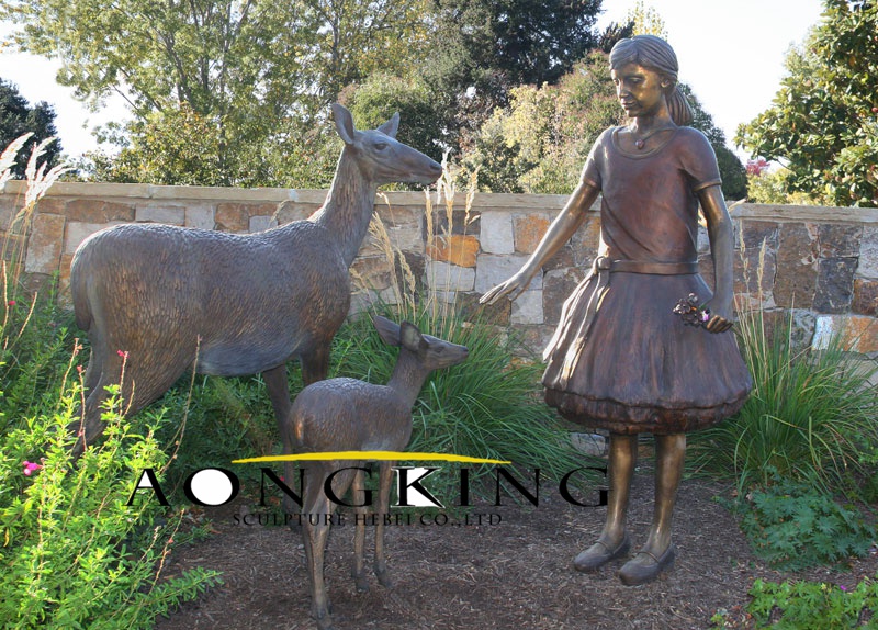 Life size girl doe fawn statue
