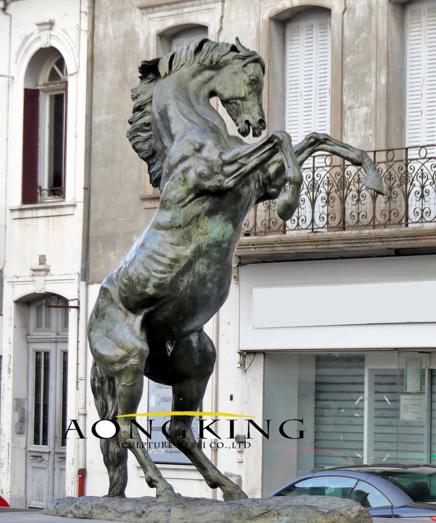 Rearing stallion bronze statue