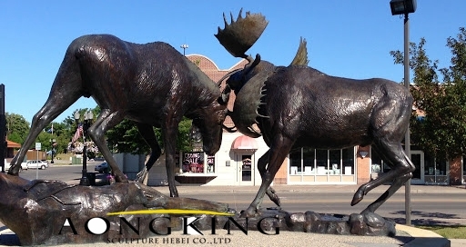 Fighting elk copper sculpture