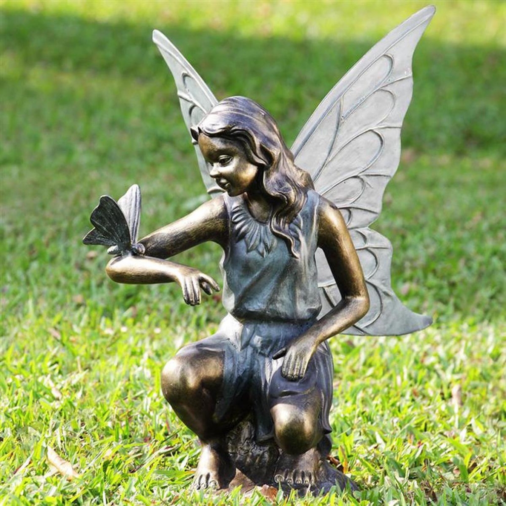 Girl angel sculpture with butterfly