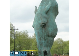 Large patina horse head statue