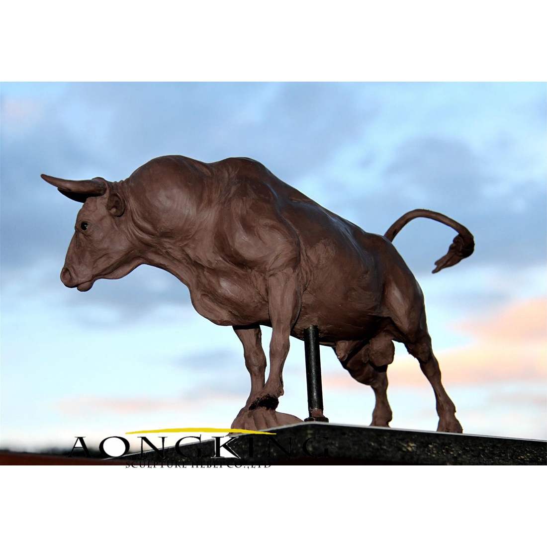 Standing brown bull bronze statue