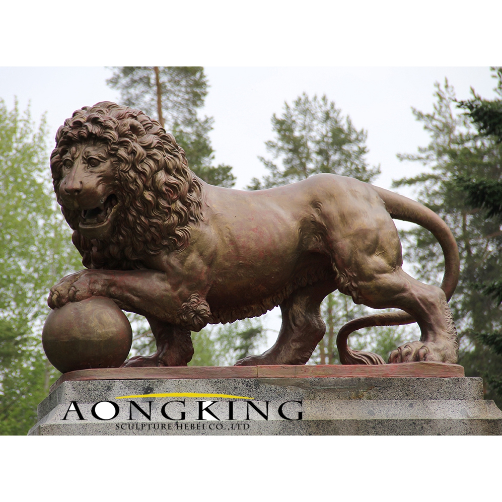 Playing bronze lion statue
