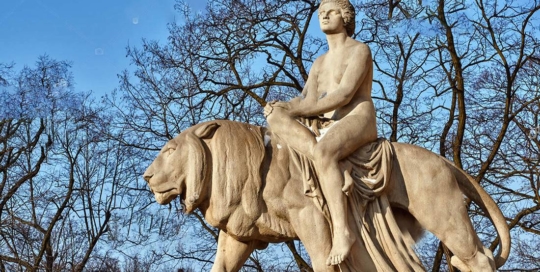 Riding a lion man marble statue