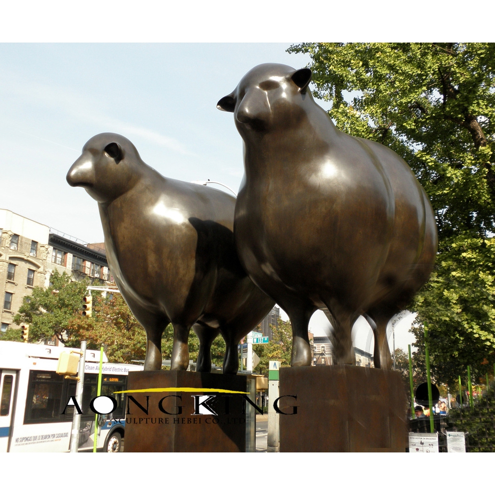 Sheep pair made by peter woytuk bronze sculpture
