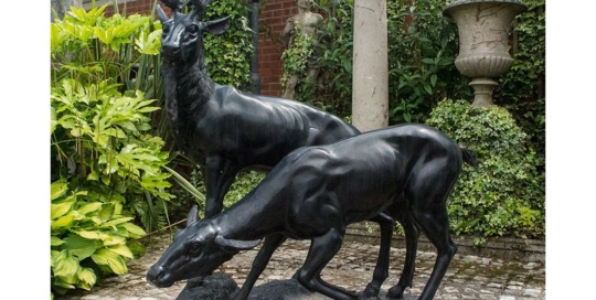 Stag doe bronze garden statue