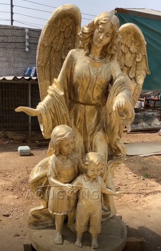 Angel with children statue