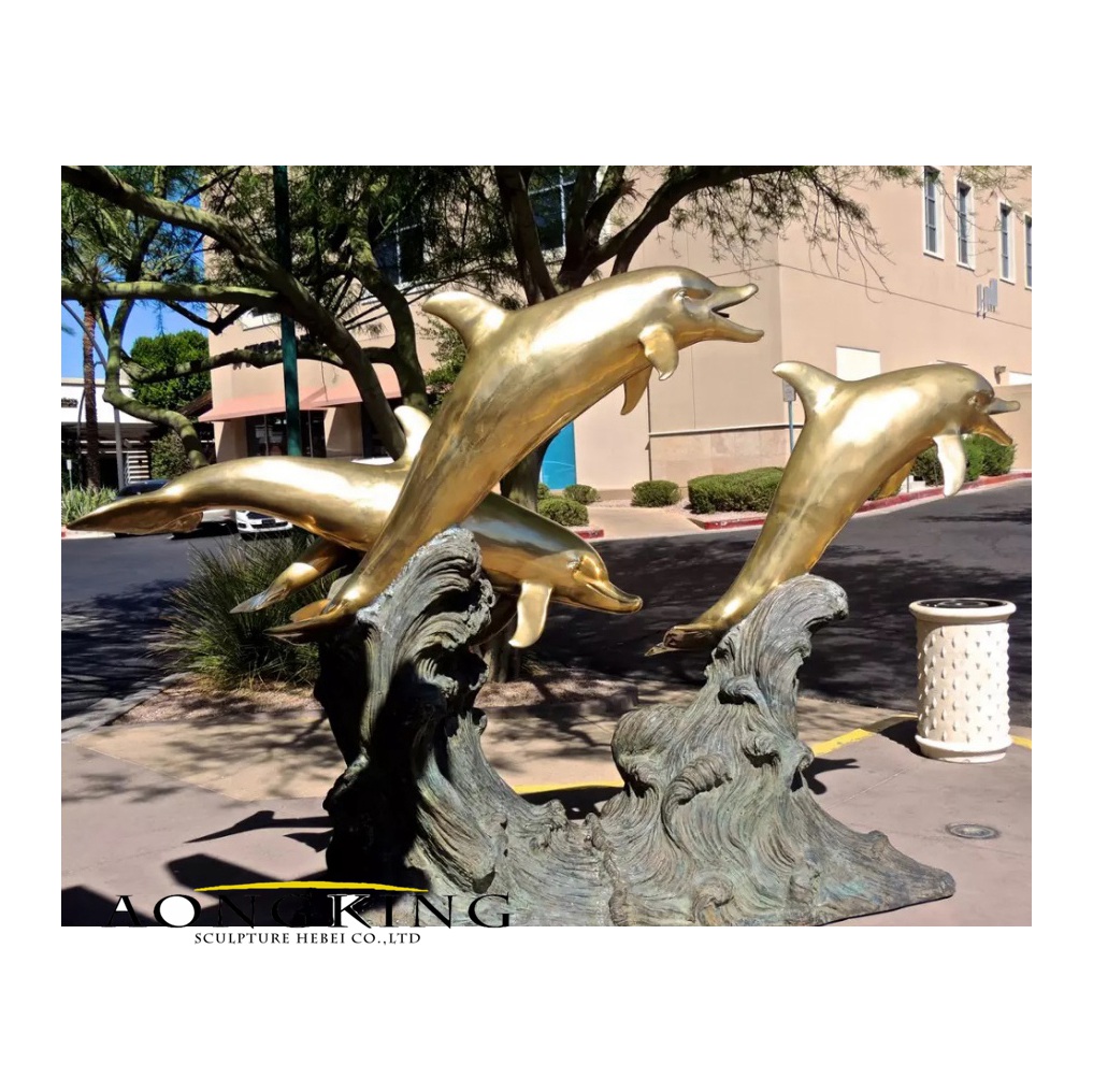 Bronze dolphin statues