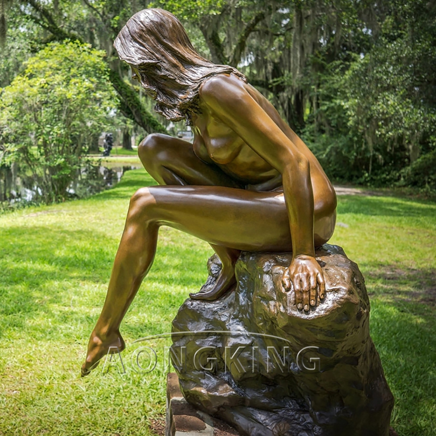 Nude woman bronze statue
