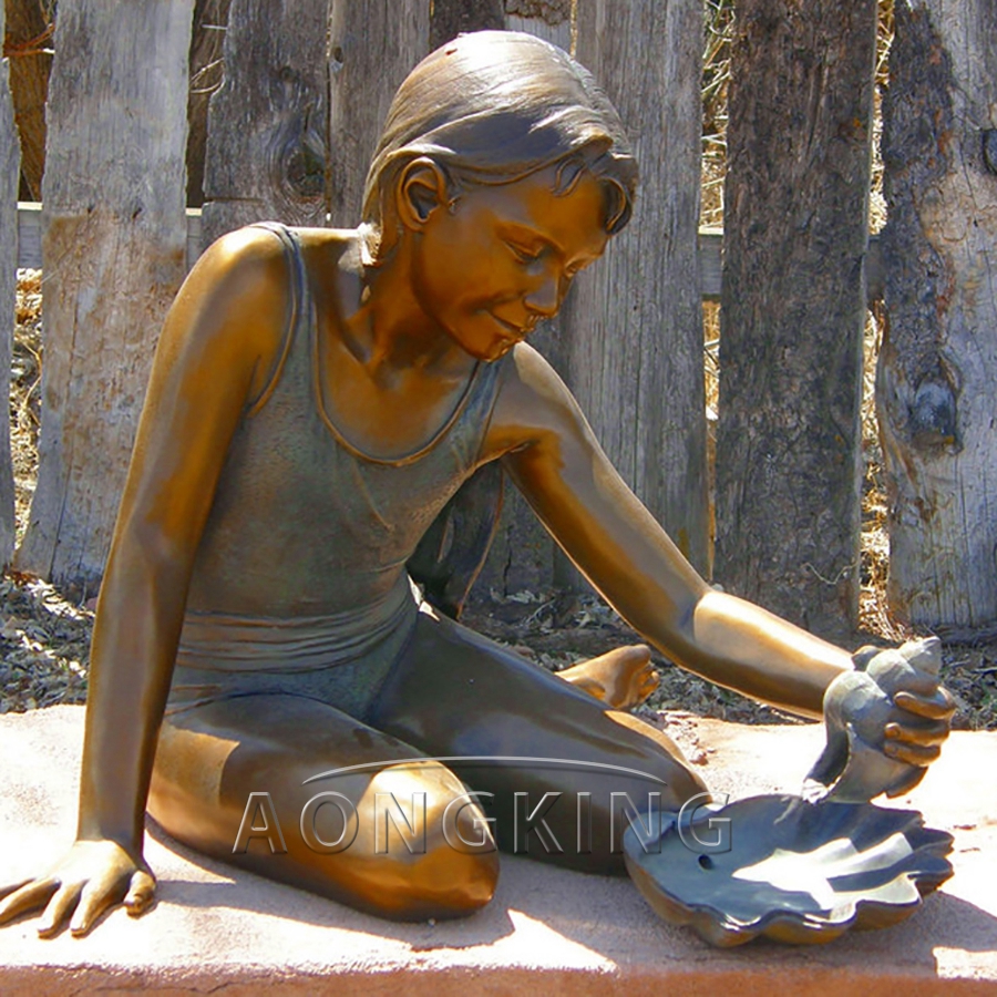 Sitting boy bronze sculpture