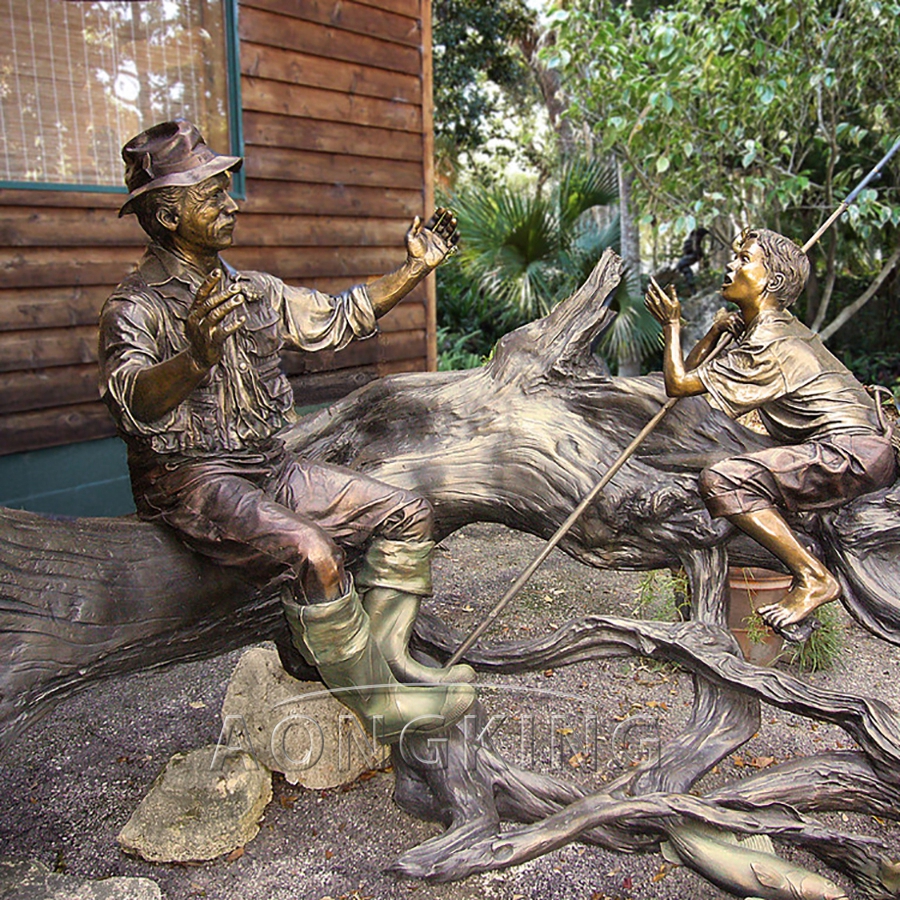 Fisherman and boy bronze statues