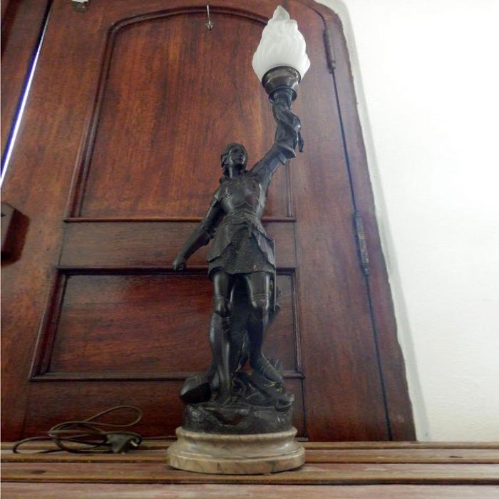 Woman lamp in the door