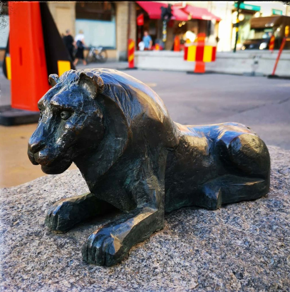A bronze little lion sculpture