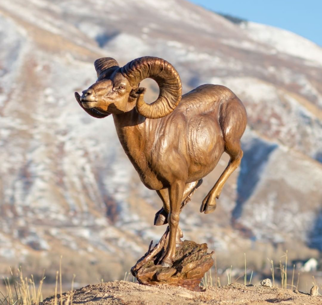 Bronze goat sculpture