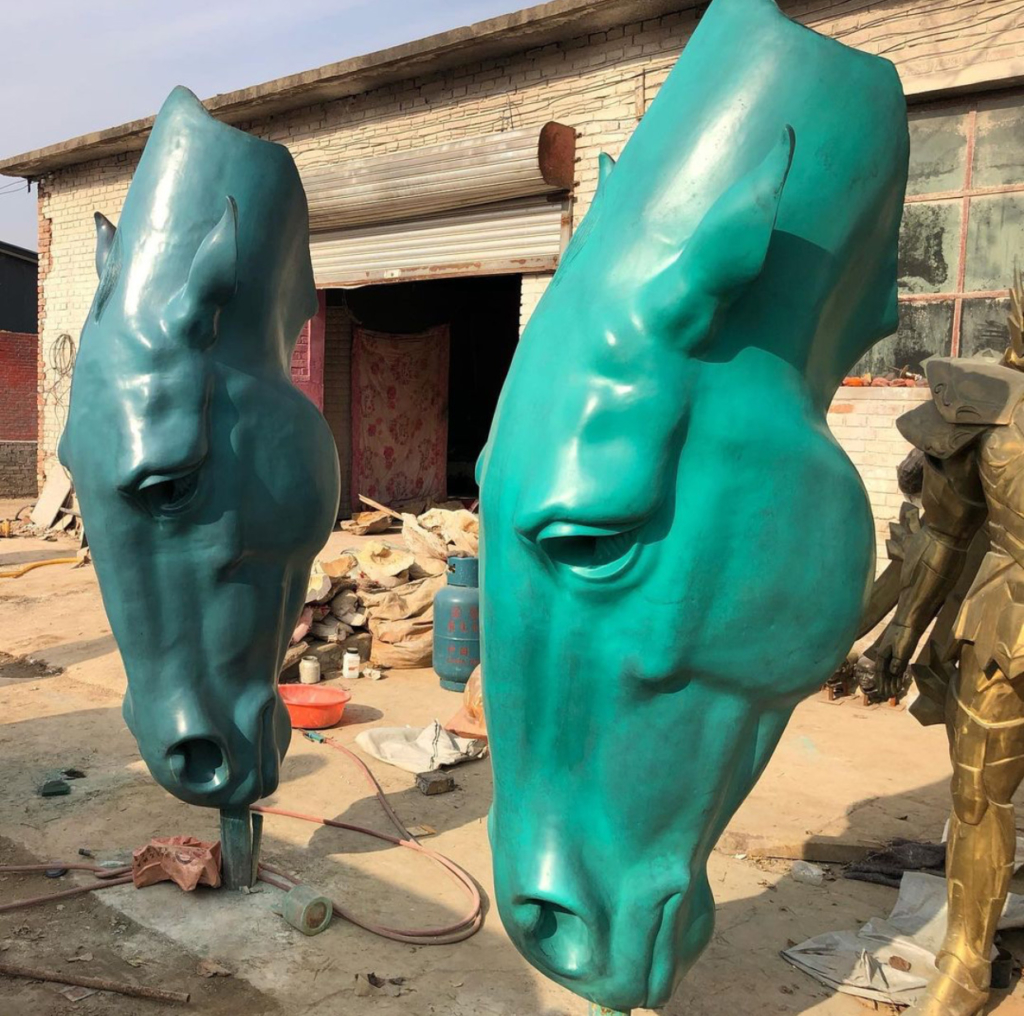 Large bronze horse head sculpture
