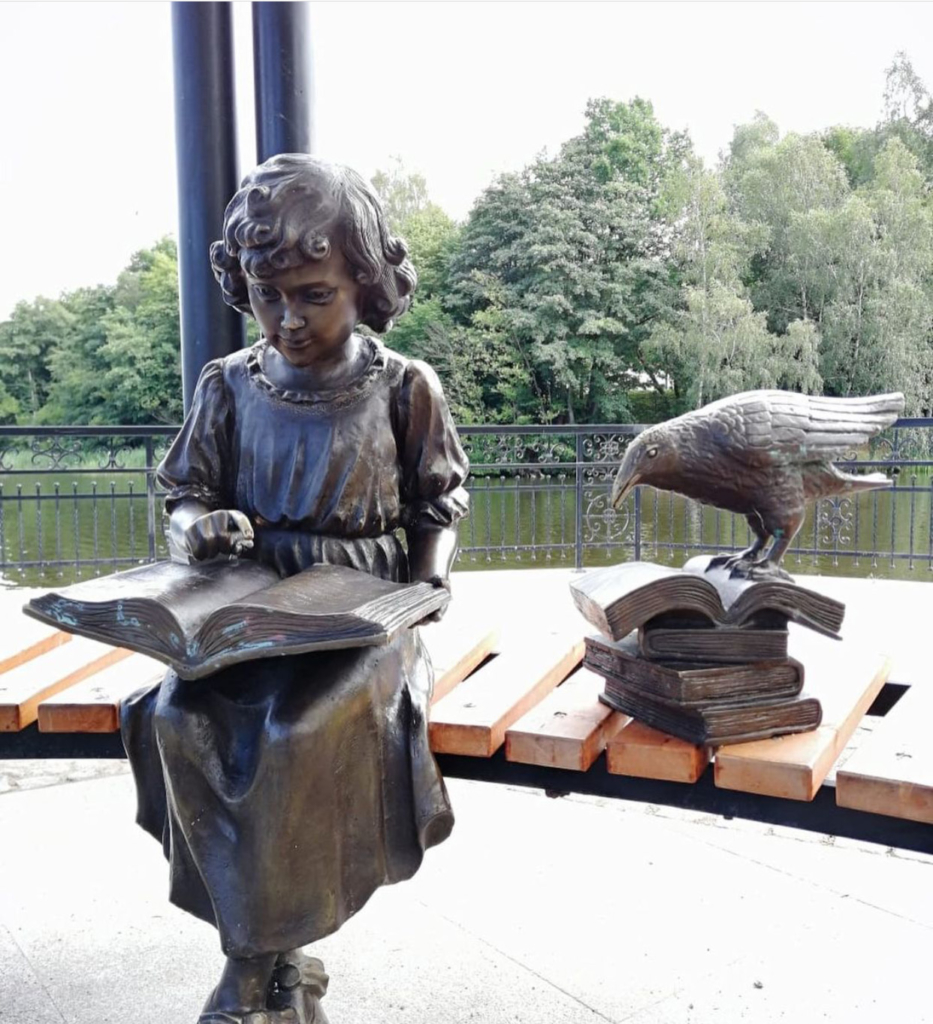 The little girl reading a book