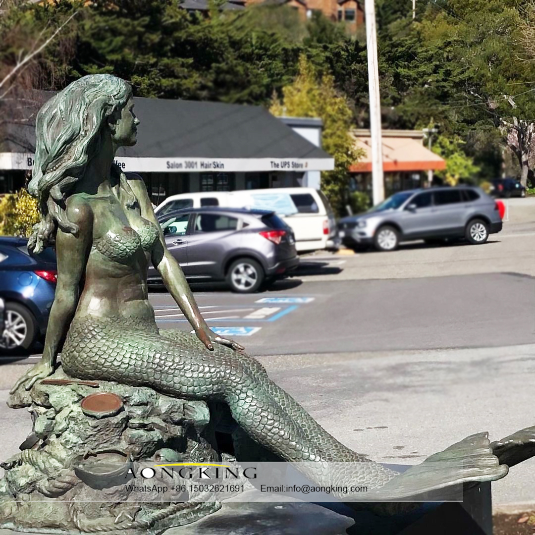 Mermaid sitting on the Stone