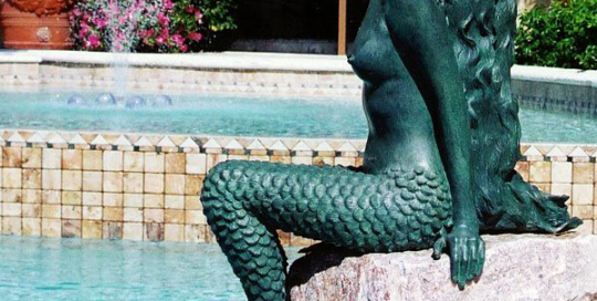 bronze swimming pool mermaid statue