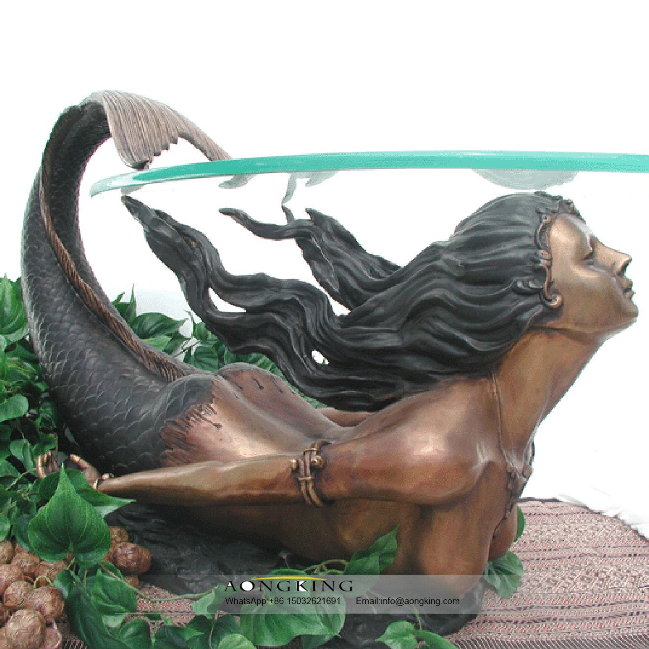 swimming bronze mermaid sculpture