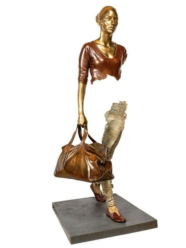 travel woman statue