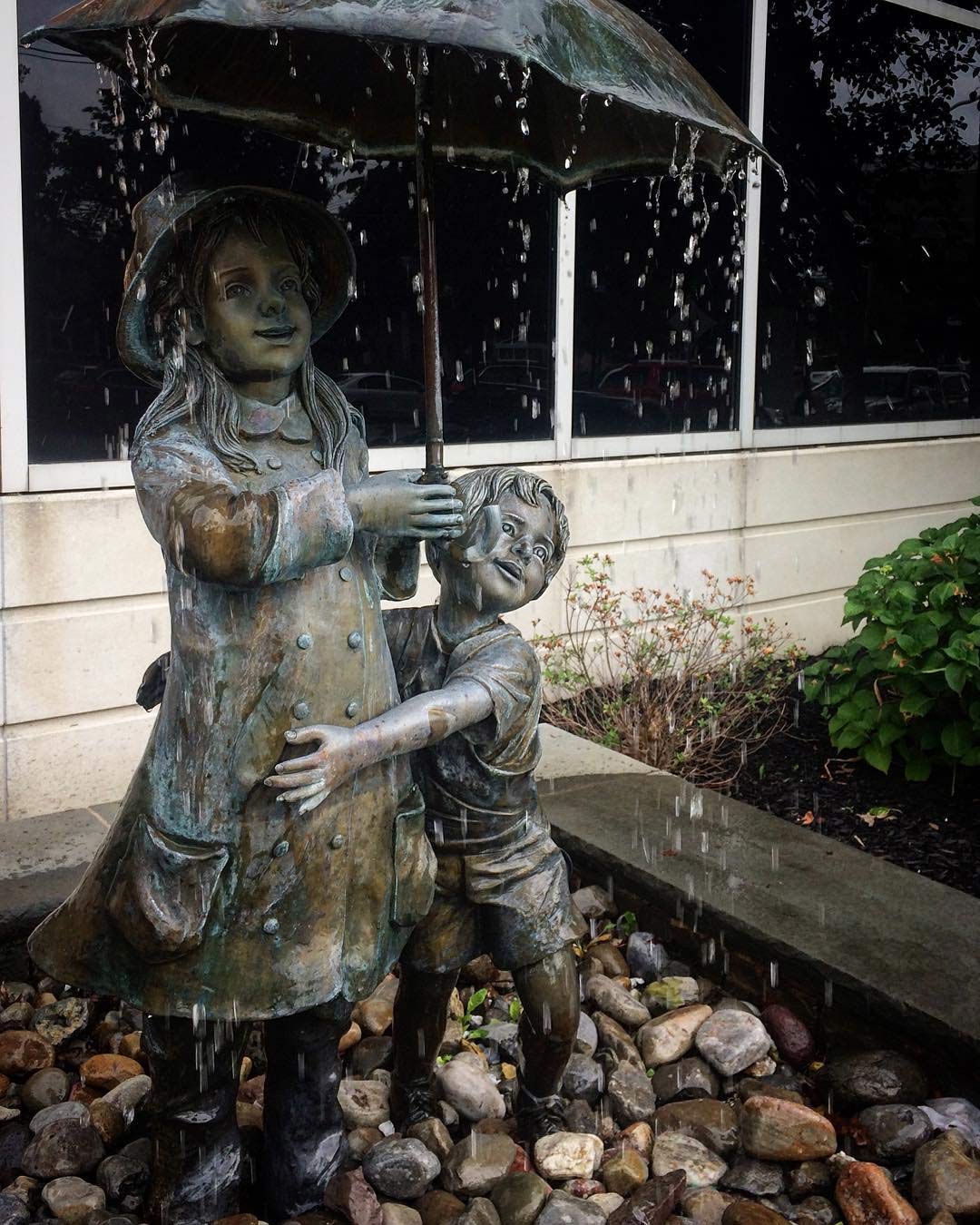 boy and girl garden statues