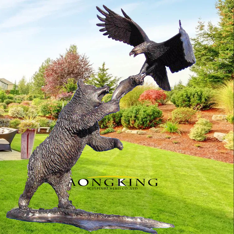 fighting bear and eagle statue
