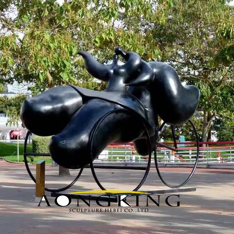 bronze fat couple riding sculpture