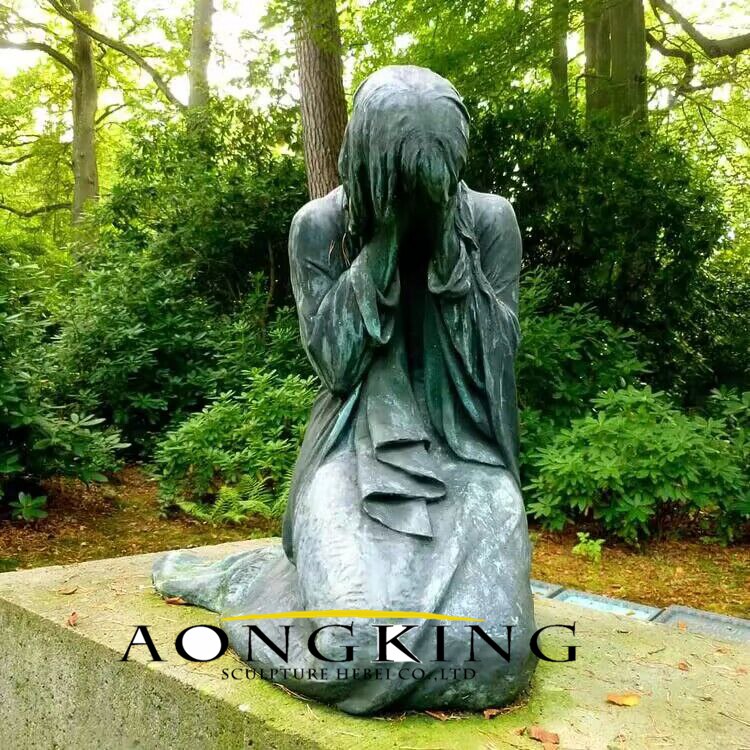 bronze weeping woman sculpture