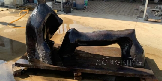 bronze sculpture of Reclining Figure Arch Leg