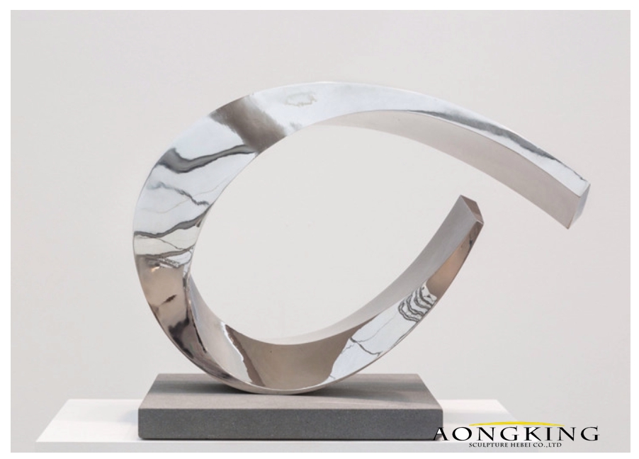stainless steel curved line sculpture